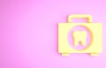 Yellow First aid kit icon isolated on pink background. Medical box with cross. Medical equipment for emergency