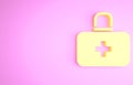 Yellow First aid kit icon isolated on pink background. Medical box with cross. Medical equipment for emergency