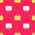 Yellow First aid kit icon isolated seamless pattern on red background. Medical box with cross. Medical equipment for