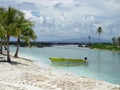 Yellow Fishing canoe on South Pacific Beach, Bora Bora, French Polynesia