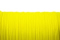 Yellow fishing line close up on white Royalty Free Stock Photo