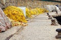 Yellow fishing nets in the harbor on Crete Island Royalty Free Stock Photo