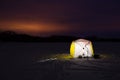 Yellow Fishing Tent On Ice Under Colorful Sky At Night Winter. Royalty Free Stock Photo