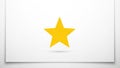 A yellow five pointed star is centered on a plain white background Royalty Free Stock Photo