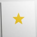 Ve-pointed star is centered on a plain white rectangular surface, likely Royalty Free Stock Photo
