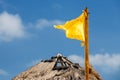 Yellow flag and blue sky Royalty Free Stock Photo