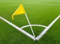 Yellow flag on the corner of a football field. Place for a corner kick on a soccer ball Royalty Free Stock Photo