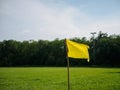 yellow flag at corner of soccer field. sport flag and sign concept. Royalty Free Stock Photo