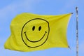 Yellow flag with smiley face