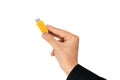 Yellow flash drive on hand with isolated white background Royalty Free Stock Photo