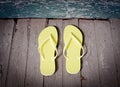 Yellow Flip-Flops On The Porch