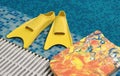 Yellow flippers with board Royalty Free Stock Photo