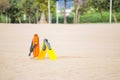 yellow flippers on an empty beach Royalty Free Stock Photo