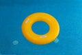 Yellow float on a pool with crystal clear water Royalty Free Stock Photo