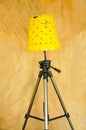 Yellow floor lamp, D.I.Y by pot and tripods.