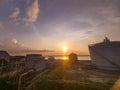 The afternoon sunset and the ammonia storagetank.