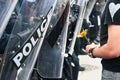 Yellow Flower and Police G8/G20 Protest Royalty Free Stock Photo