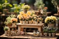 Yellow flower seedlings and garden items on a wooden table
