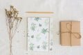 Yellow flowers with notebook, wooden pencil and brown gift box. Royalty Free Stock Photo