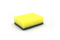 Yellow foam rubber sponge for dishwashing on white background. Simple everyday cleaning sponge