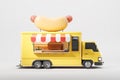 Yellow food truck with kitchen, hot dog. Isolated over grey background Royalty Free Stock Photo