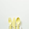 Yellow fork knife spoon on white background Royalty Free Stock Photo