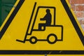 Yellow Fork Lift Truck Operating Warning Sign Royalty Free Stock Photo