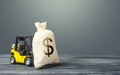 Yellow forklift carries a dollar money bag. Tax payment. Payment of taxes. Big contract, profitable deposit, take a loan. Wealth,