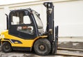 Yellow Forklift stands on a construction site Royalty Free Stock Photo