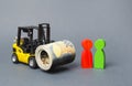 Yellow Forklift truck carries a large bundle of Euros, a customer and seller. Investments, Preferential cheap loans for business Royalty Free Stock Photo