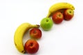 Apple-banana flight on white background Royalty Free Stock Photo