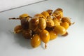 Yellow fresh dates nature age palm panicle Royalty Free Stock Photo