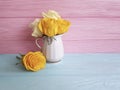 Yellow fresh rose vase wooden background frame nature greeting decoration