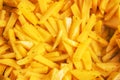 Yellow fried fries closeup, background or texture Royalty Free Stock Photo