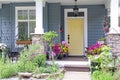 Yellow front door of a small house in the suburbs of Canada Royalty Free Stock Photo