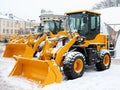 Yellow front loaders