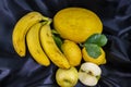 Yellow fruit on a black background Royalty Free Stock Photo