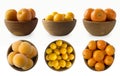 Yellow fruits isolated on white background. Fruits in a wooden bowl with copy space for text. Apricots, yellow plums and and tange Royalty Free Stock Photo