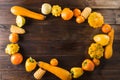 Yellow fruits and vegetables on a wooden background. Royalty Free Stock Photo