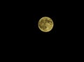 Yellow full Moon on dark night sky