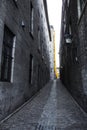 Yellow garbage chute in old town Montreal Quebec Canada Royalty Free Stock Photo