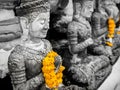 Yellow Garlands on Hands of The Bhddha Statues