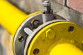 Yellow gas pipe with a crane and gear Royalty Free Stock Photo