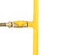 Yellow gas pipe with a valve. White background