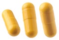 yellow gelatin capsules isolated on white Royalty Free Stock Photo