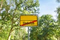 yellow german city limit sign to nowhere