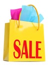 Yellow gift bag with red SALE superscription Royalty Free Stock Photo