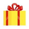 Yellow gift box with big ribbon and bow on it Royalty Free Stock Photo