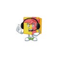 Yellow gift box cute cartoon character design with headphone Royalty Free Stock Photo