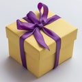 yellow gift box, purple ribbon Royalty Free Stock Photo